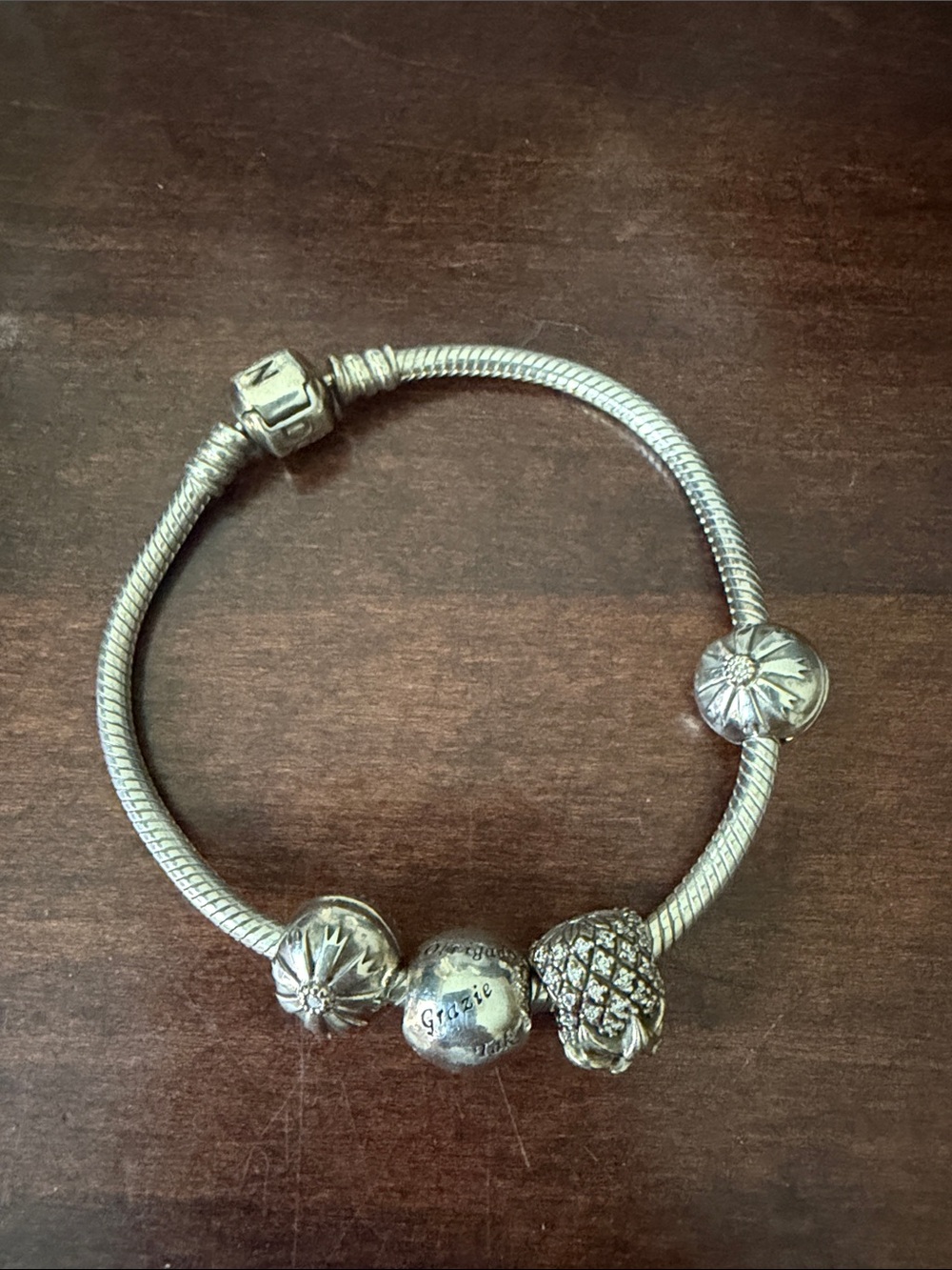 Pandora Silver Charm Bracelet with Floral and Pineapple Motifs